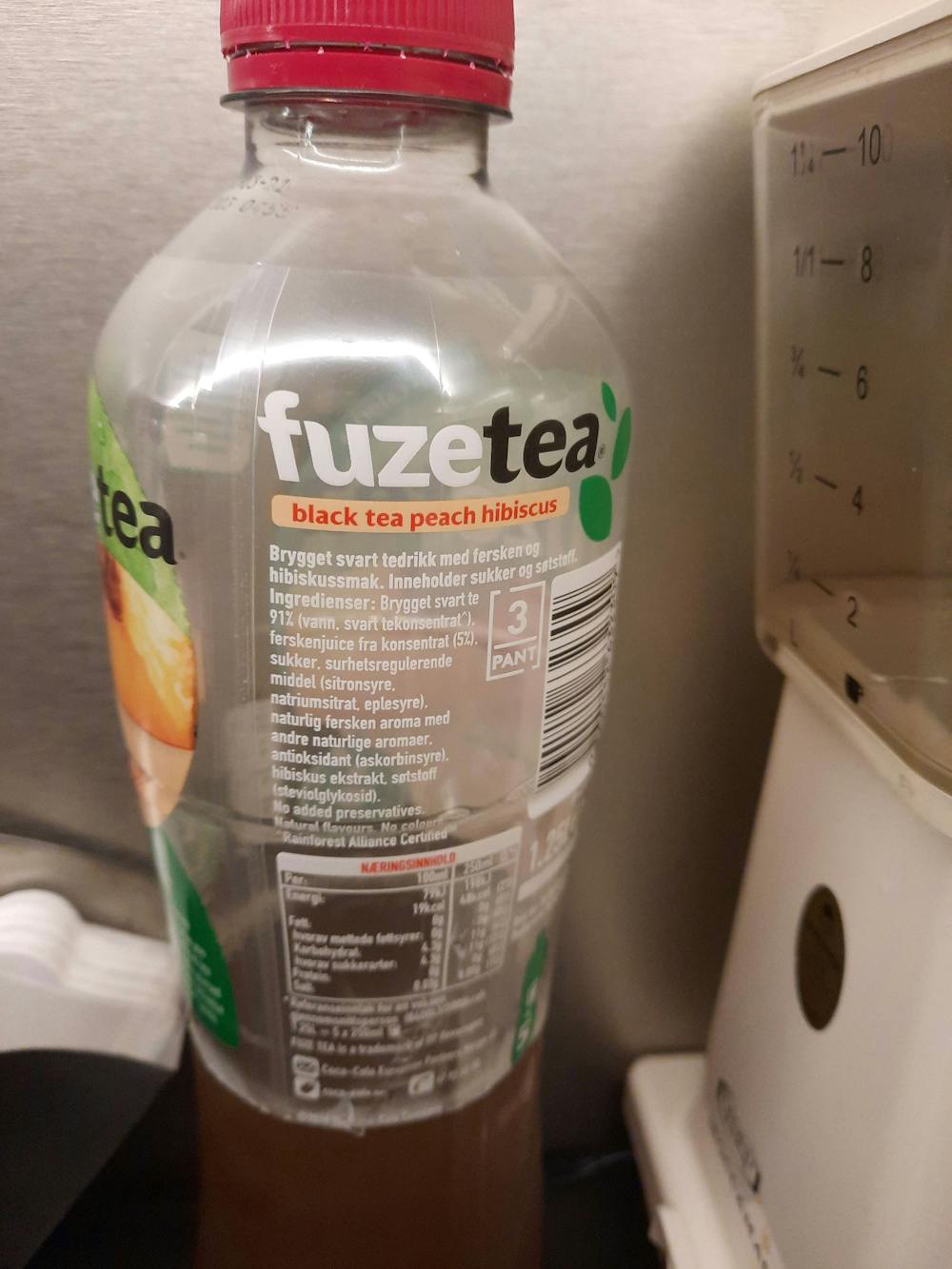Ingrediensliste - Infused iced tea, black tea, peach and hibicus, Fuzetea